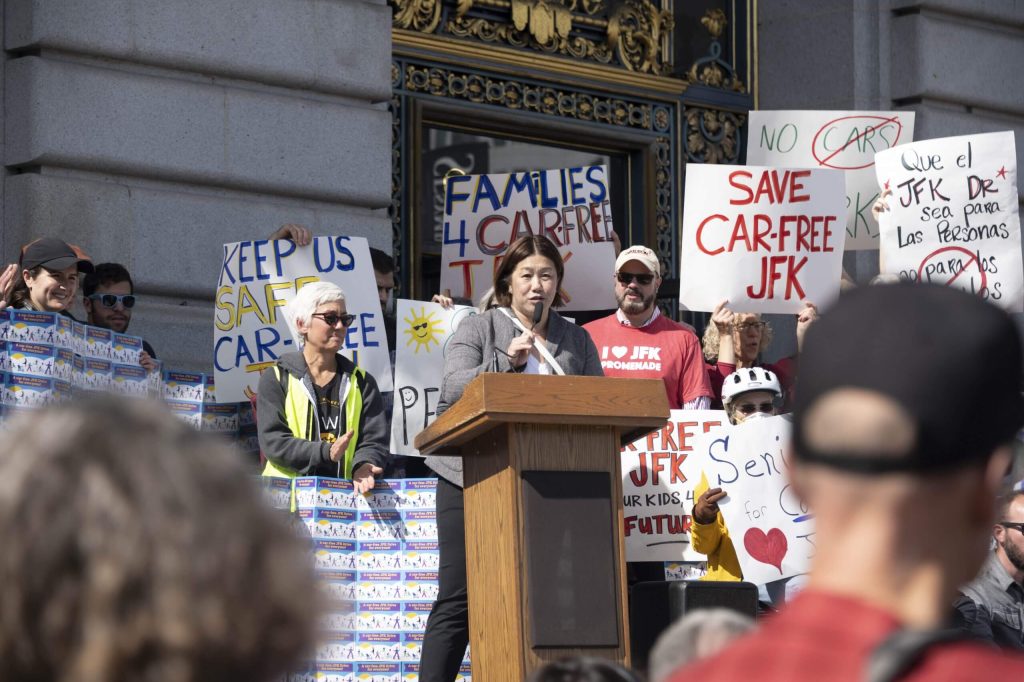 San Francisco Bicycle Coalition's executive director Janelle Wong spoke at the March 1 rally at City Hall. Photo by William McLeod.