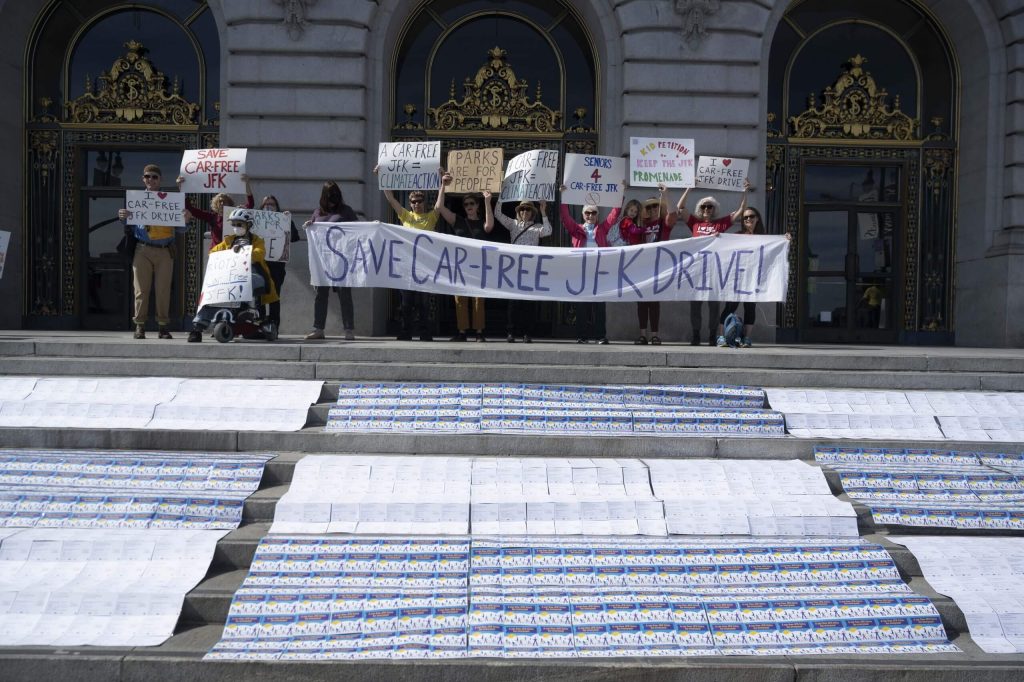 At the March 1 rally at City Hall, we laid out thousands of postcards that volunteers had taped together into quilts. Photo by William McLeod.
