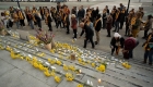 Creating a temporary memorial with a flower for each of the people killed in crashes since January 2012.