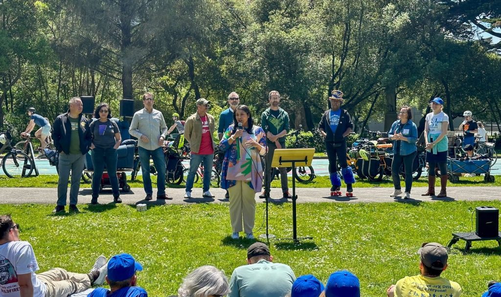 Mayor London Breed speaking at the JFK Promenade's 4th Anniversary Community Picnic.