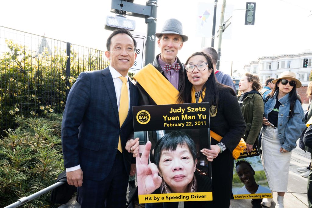 City Attorney David Chiu with Families for Safe Streets members John Lowell and Jenny Yu. Chiu championed the first attempts at state legislation as an Assemblymember. Photo by William McLeod.