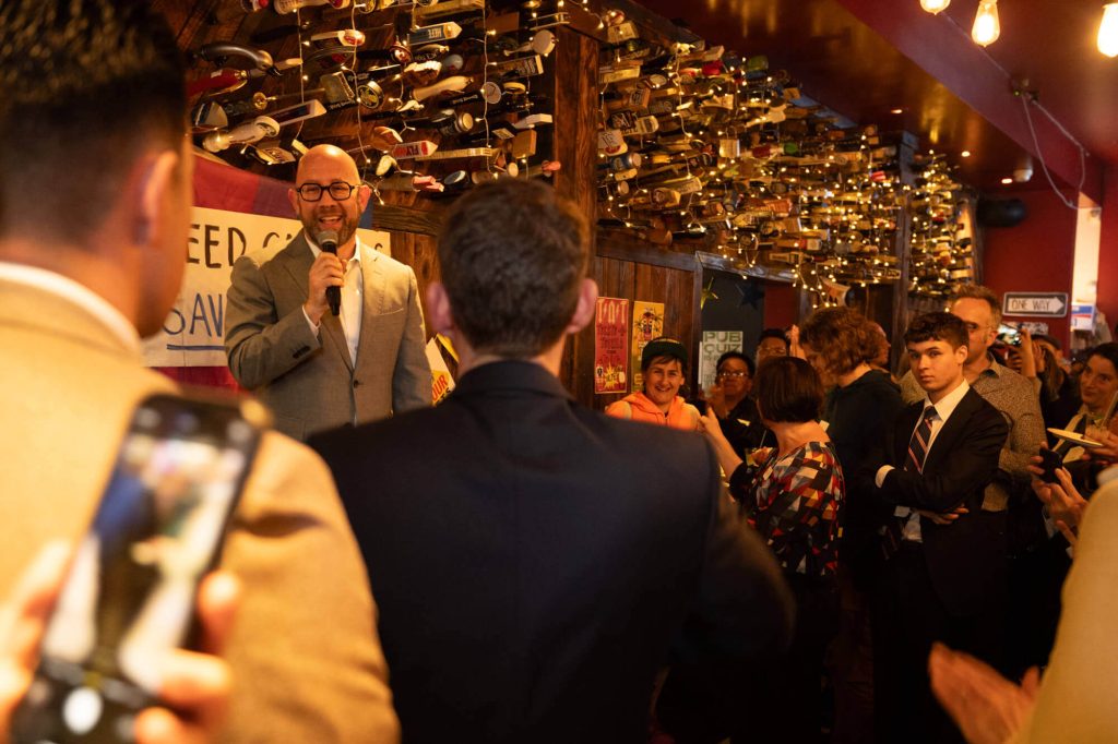 District 8 Supervisor Rafael Madelman speaking at the speed camera celebration happy hour. Mandelman's district will be getting three speed cameras. Photo by William McLeod.