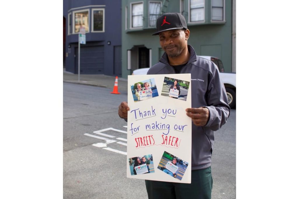 Students thanked SFMTA paint crews with a signed card. Photo by Fiona Yim.