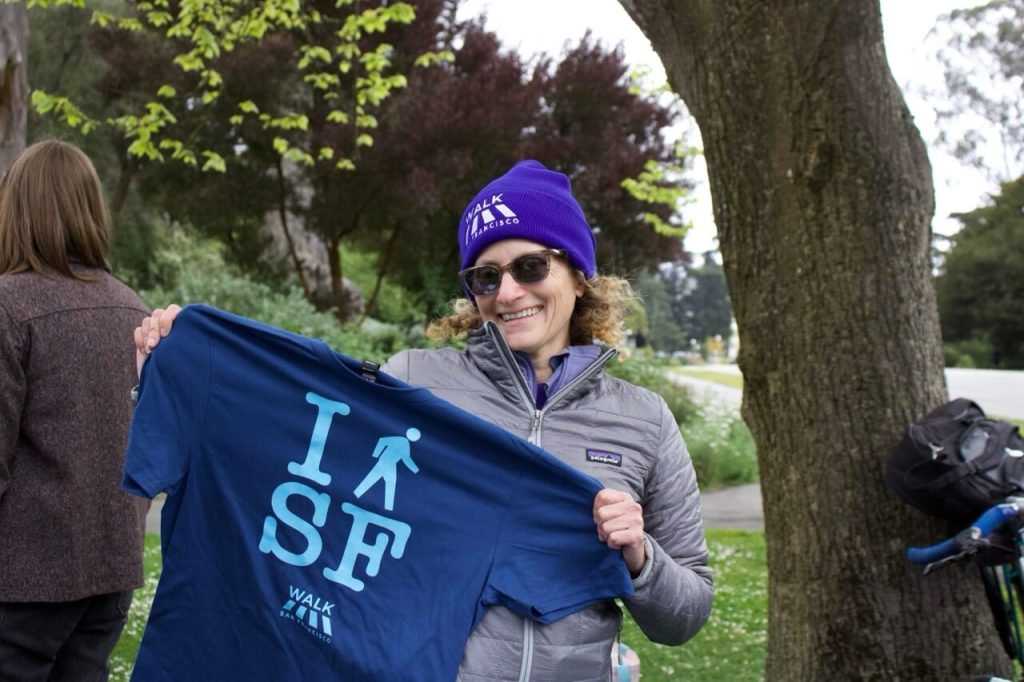 Thank you to volunteer superstar Rebecca for manning Walk SF's merch table. Photo by Fiona Yim. 