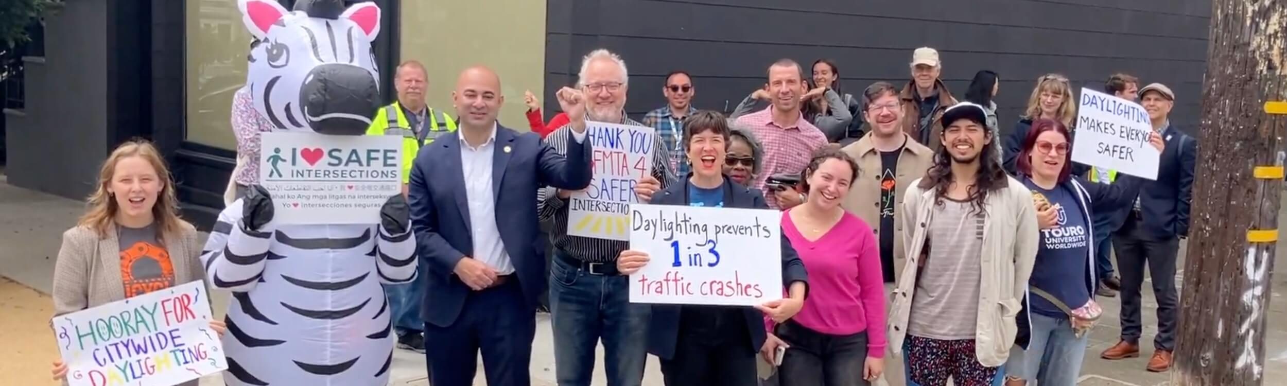 Celebrating a huge win as the SFMTA kicks off painting ‘daylighting’ at every intersection